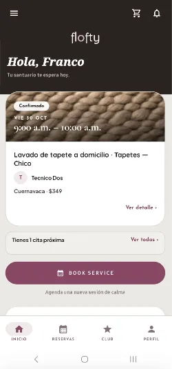 Pantalla de inicio de la app de Flofty con la próxima cita de lavado de tapete y el botón para reservar